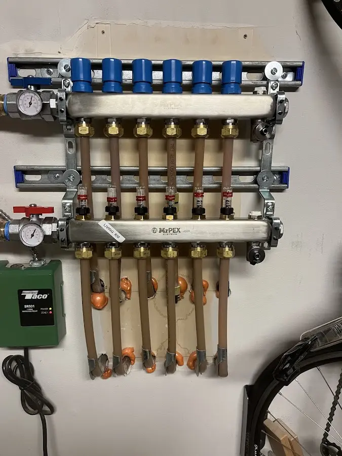 Plumber performing Water Heater Repair at a residential property in Savage